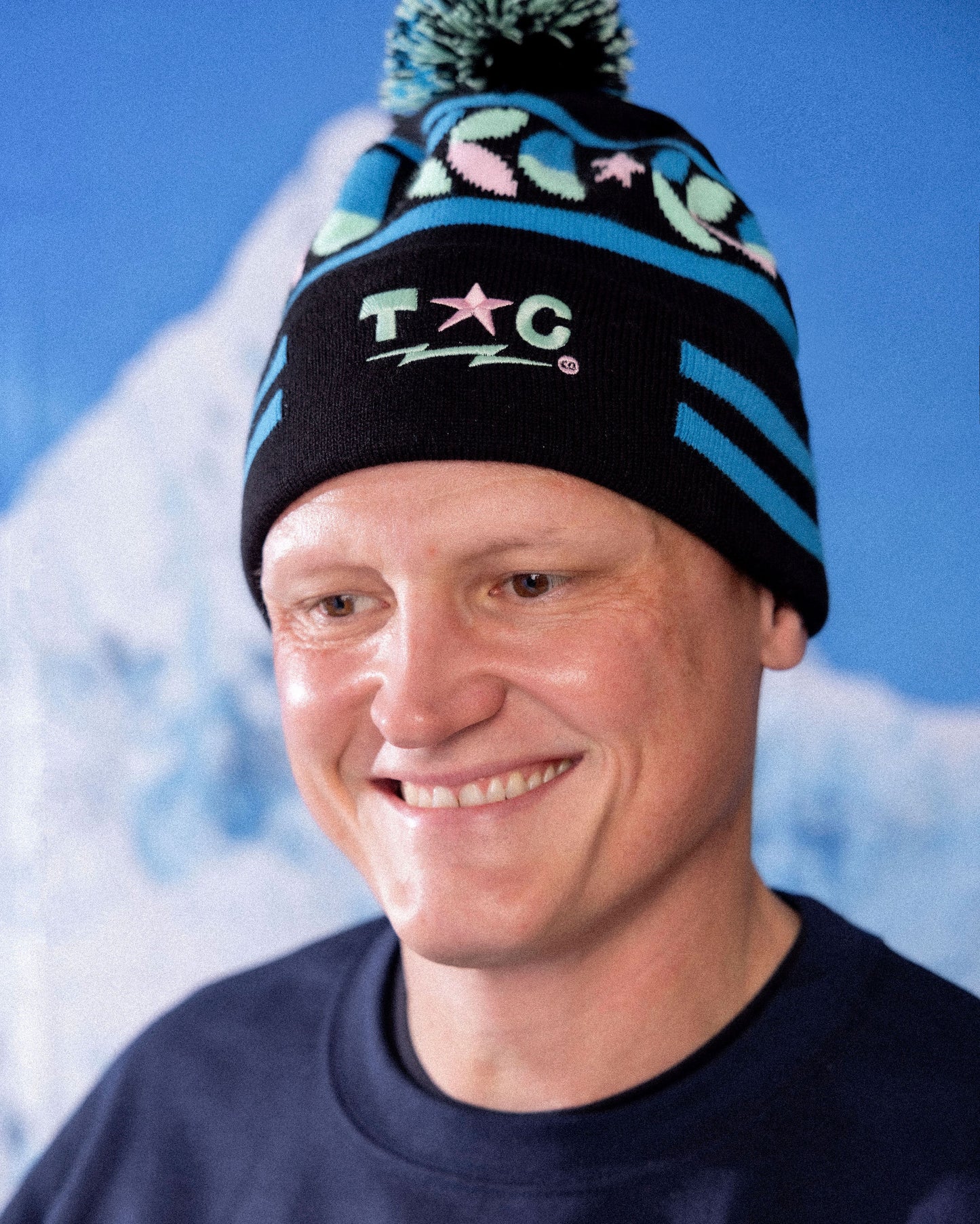 
                  
                    man with tinker beanie
                  
                